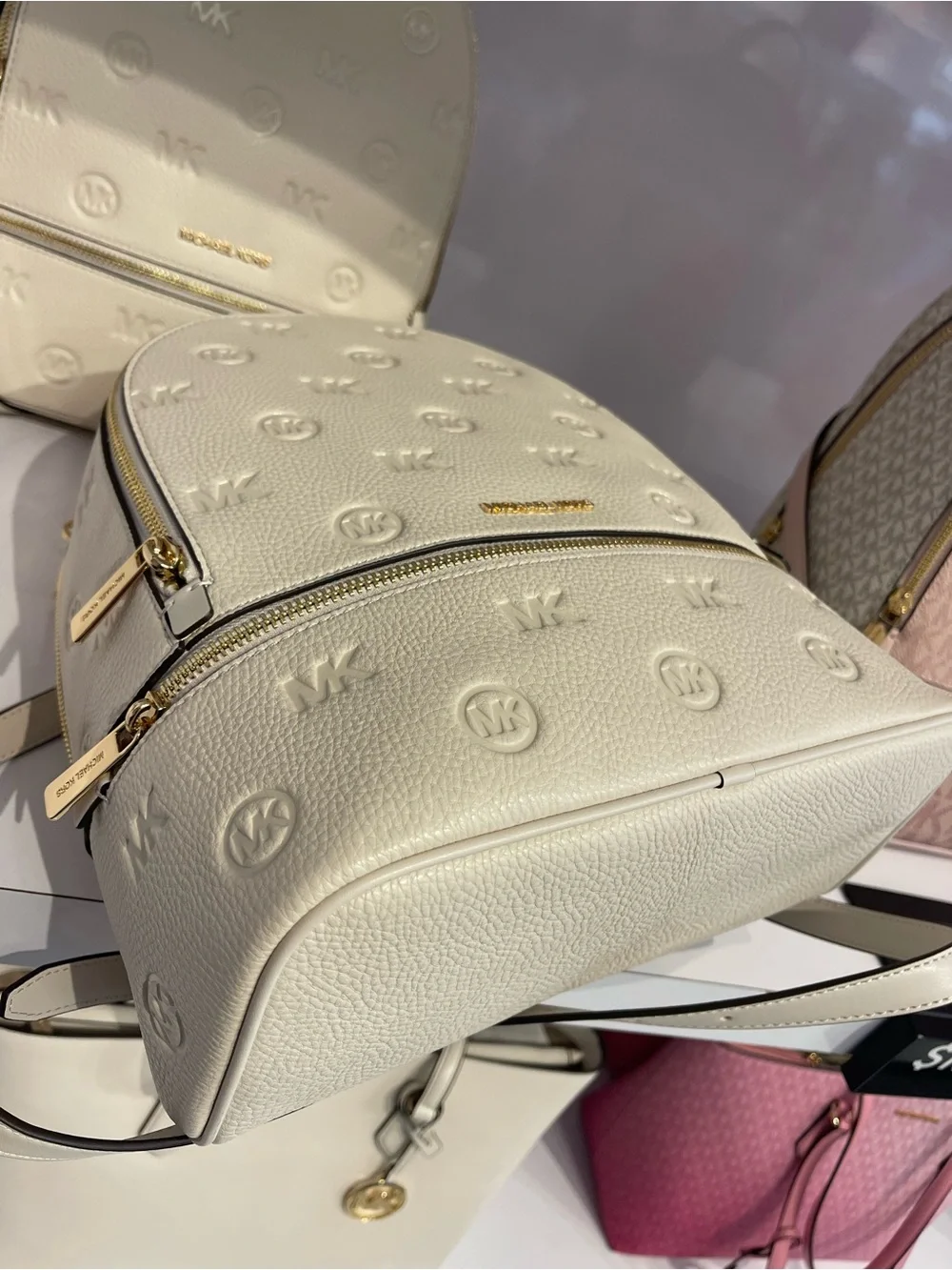 Michael Kors Rhea Medium Zip Logo Debossed Backpack Light Cream NWT